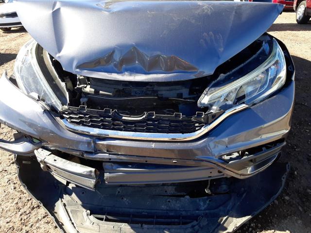 Photo 9 from auction – 2015 HONDA CR-V LX with VIN 3CZRM3H37FG717618