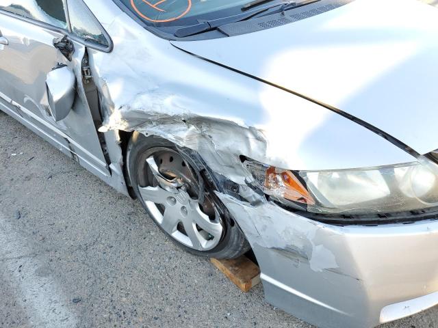 Photo 9 from auction – 2011 HONDA CIVIC LX with VIN 2HGFA1F55BH519934