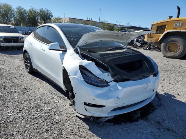 TESLA MODEL Y 2022 with VIN 7SAYGAEE4NF315310 - Photo from auction