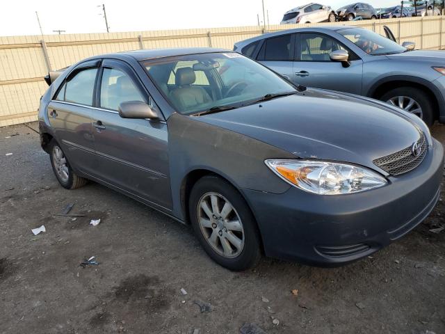 TOYOTA CAMERY 2003 with VIN 4T1BE32KX3U678614 - Photo from auction
