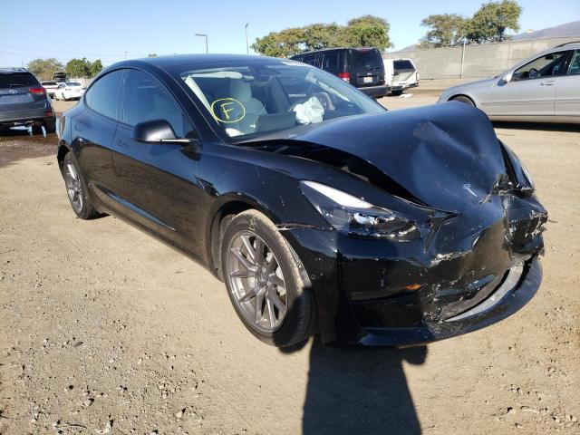 TESLA MODEL 3 2021 with VIN 5YJ3E1EA5MF877144 - Photo from auction