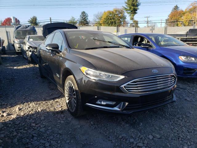 FORD FUSION TIT 2017 with VIN 3FA6P0SU0HR347562 - Photo from auction