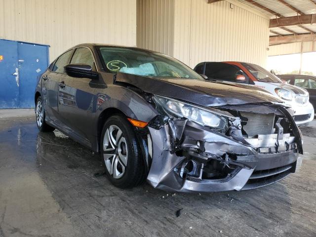 HONDA CIVIC LX 2018 with VIN 19XFC2F59JE016528 - Photo from auction