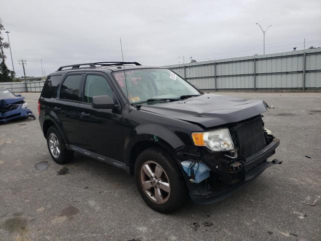 FORD ESCAPE XLT 2011 with VIN 1FMCU0DG7BKB71470 - Photo from auction