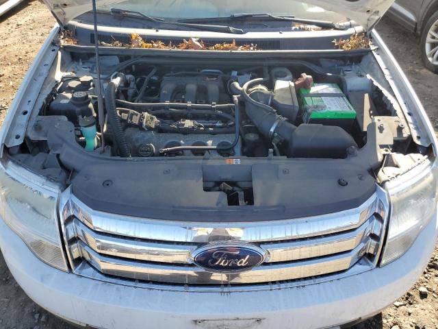 Photo 7 from auction – 2008 FORD TAURUS X E with VIN 1FMDK07W08GA28157