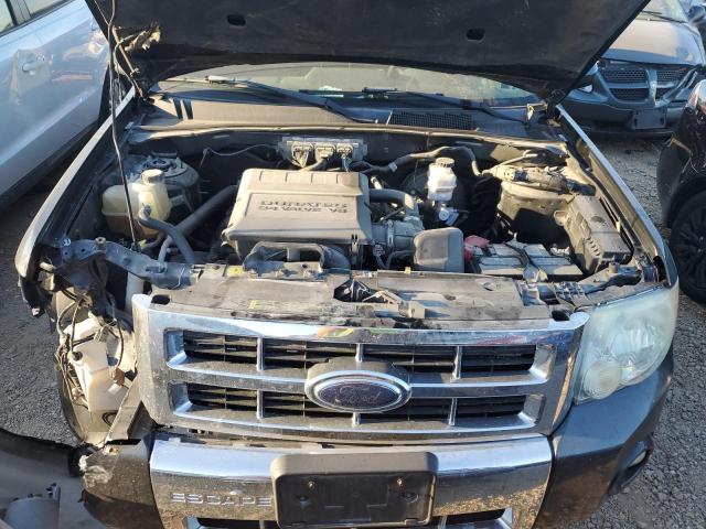 Photo 7 from auction – 2009 FORD ESCAPE LIM with VIN 1FMCU94G59KB94275