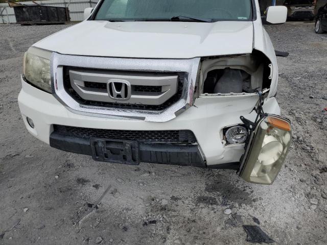 Photo 7 from auction – 2009 HONDA PILOT EXL with VIN 5FNYF48559B040811