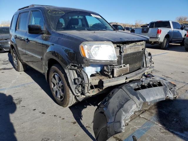 HONDA PILOT TOUR 2011 with VIN 5FNYF4H99BB096386 - Photo from auction