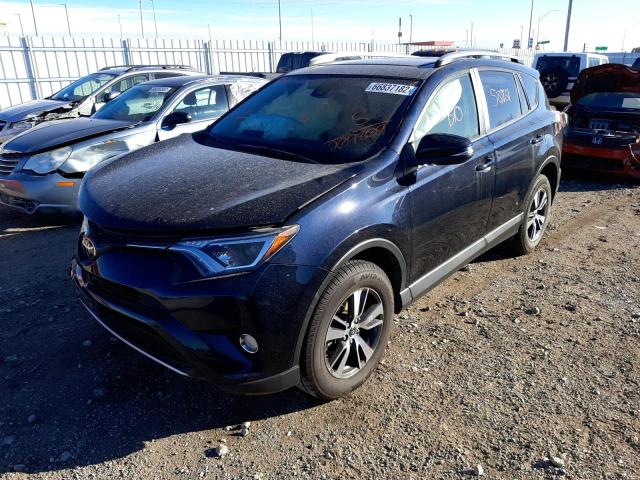 Photo 2 from auction – 2017 TOYOTA RAV4 XLE with VIN JTMRFREV4HD209809