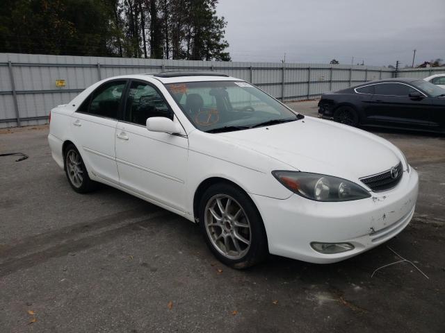 TOYOTA CAMRY LE 2004 with VIN 4T1BE30K14U326008 - Photo from auction
