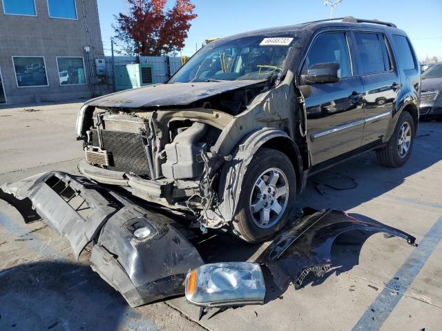Foto 2 de la subasta – 2011 HONDA PILOT TOUR con VIN 5FNYF4H99BB096386