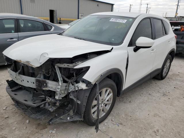 Photo 2 from auction – 2015 MAZDA CX-5 TOURI with VIN JM3KE2CY7F0454690