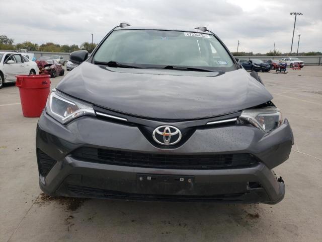 Photo 5 from auction – 2016 TOYOTA RAV4 LE with VIN JTMZFREV5GJ070788