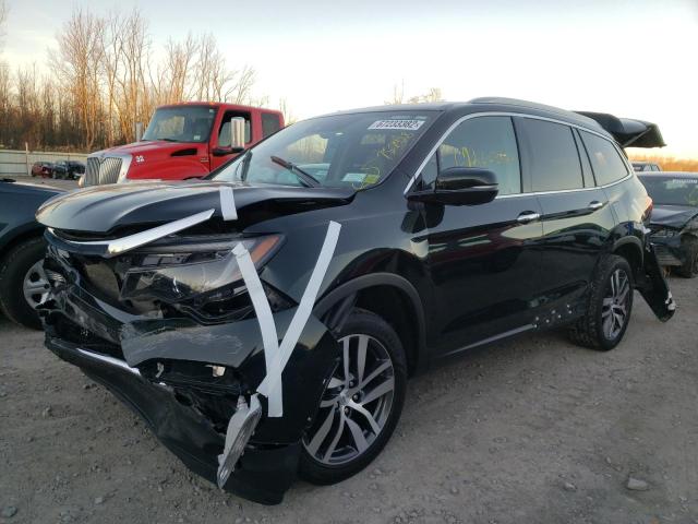 Photo 2 from auction – 2018 HONDA PILOT ELIT with VIN 5FNYF6H05JB043227