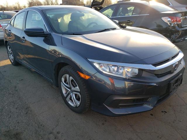 HONDA CIVIC LX 2018 with VIN 2HGFC2F50JH515692 - Photo from auction