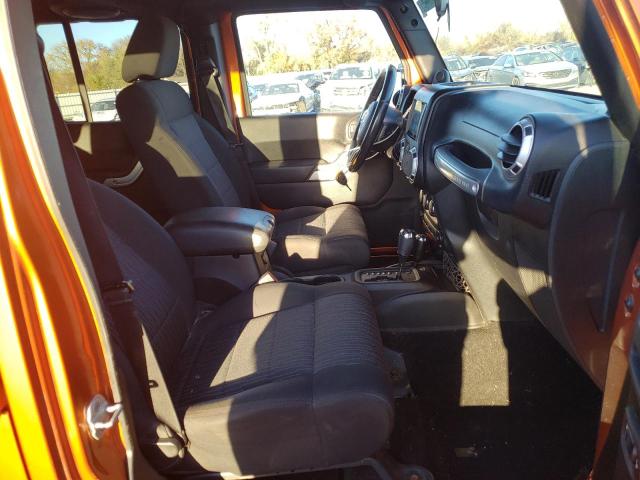Photo 5 from auction – 2011 JEEP WRANGLER U with VIN 1J4BA5H13BL572210