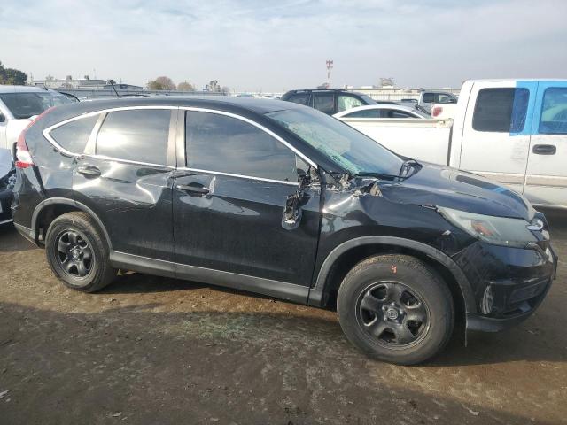 Photo 9 from auction – 2015 HONDA CR-V LX with VIN 3CZRM3H32FG708034