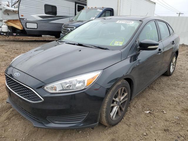 Photo 2 from auction – 2016 FORD FOCUS SE with VIN 1FADP3F24GL323487