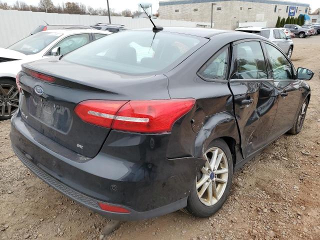 Photo 4 from auction – 2016 FORD FOCUS SE with VIN 1FADP3F24GL323487