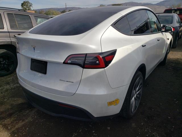 Photo 4 from auction – 2021 TESLA MODEL Y with VIN 5YJYGAEE0MF159262