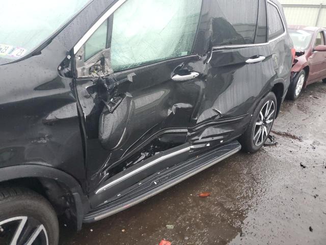 Photo 9 from auction – 2022 HONDA PILOT TOUR with VIN 5FNYF6H6XNB062124