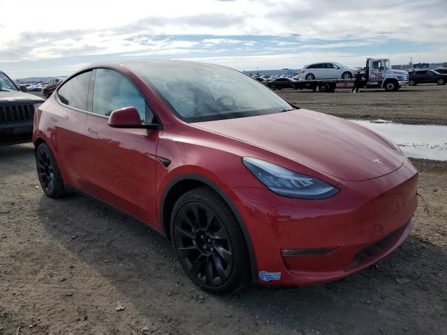 TESLA MODEL Y 2021 with VIN 5YJYGAEEXMF144414 - Photo from auction