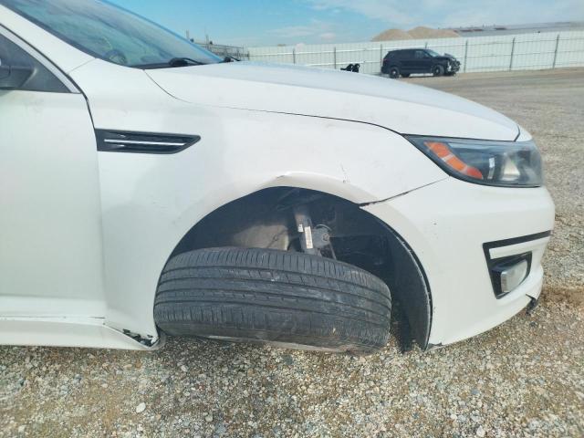 Photo 9 from auction – 2014 KIA OPTIMA LX with VIN KNAGM4A79E5519688