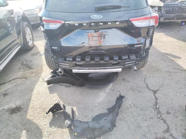 Photo 9 from auction – 2022 FORD ESCAPE SE with VIN 1FMCU9BZ9NUA28358