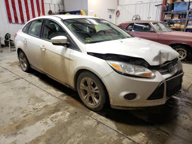 FORD FOCUS SE 2014 with VIN 1FADP3F20EL263642 - Photo from auction