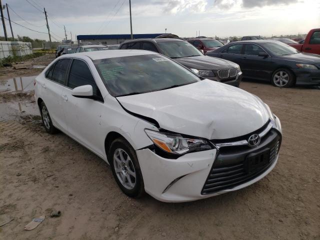 TOYOTA CAMRY LE 2017 with VIN 4T1BF1FK2HU661292 - Photo from auction