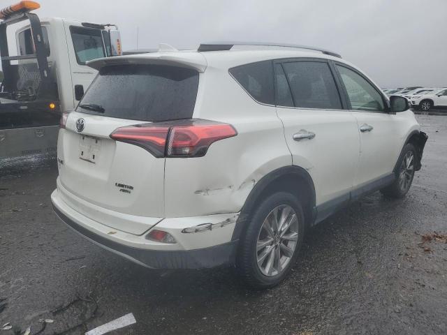 Photo 4 from auction – 2018 TOYOTA RAV4 LIMIT with VIN JTMDFREV9JD246130
