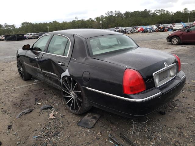 Photo 3 from auction – 2004 LINCOLN TOWN CAR U with VIN 1LNHM83WX4Y614532
