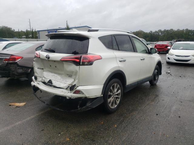 Photo 4 from auction – 2016 TOYOTA RAV4 LIMIT with VIN JTMDFREV9GJ071436