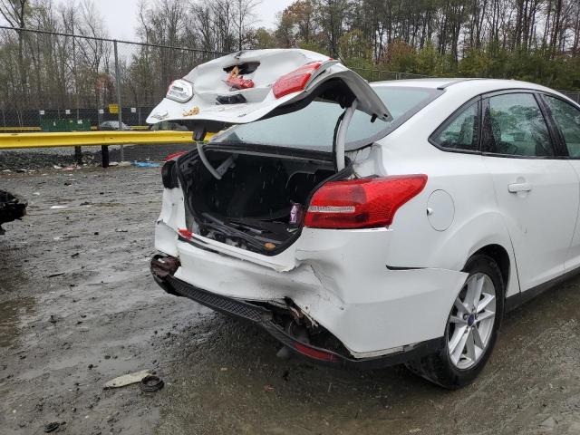 Photo 9 from auction – 2015 FORD FOCUS SE with VIN 1FADP3F25FL263895