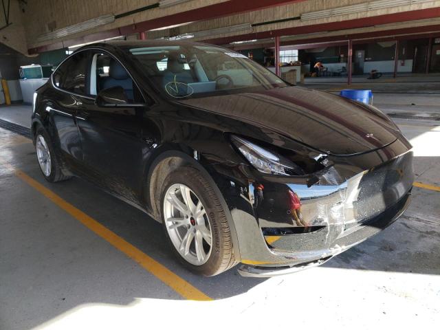 TESLA MODEL Y 2022 with VIN 7SAYGAEE1NF366215 - Photo from auction