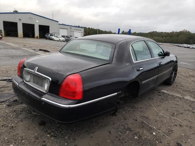 Photo 4 from auction – 2004 LINCOLN TOWN CAR U with VIN 1LNHM83WX4Y614532