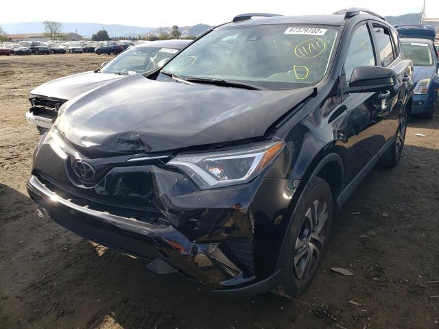 Photo 2 from auction – 2018 TOYOTA RAV4 LE with VIN 2T3ZFREV2JW521149