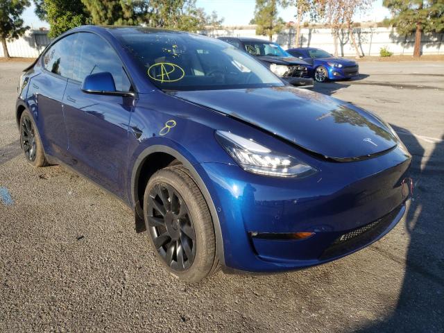 TESLA MODEL Y 2022 with VIN 7SAYGDEE3NF513507 - Photo from auction