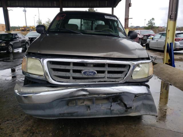 Photo 9 from auction – 2003 FORD F150 SUPER with VIN 1FTRW07673KA75271