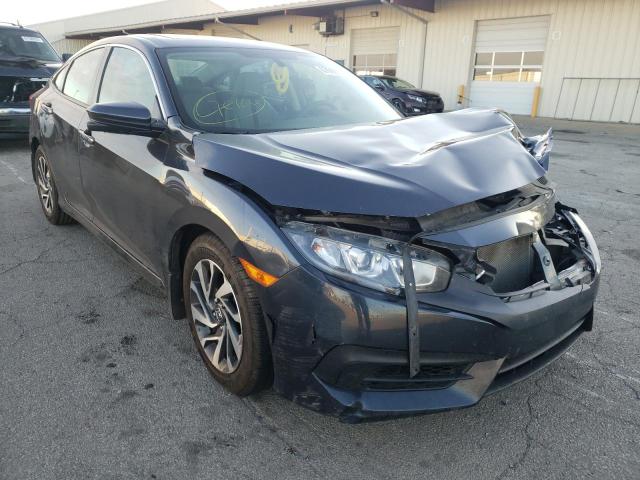 HONDA CIVIC EX 2018 z numerem VIN 2HGFC2F76JH504648 - Zdjęcie z aukcji