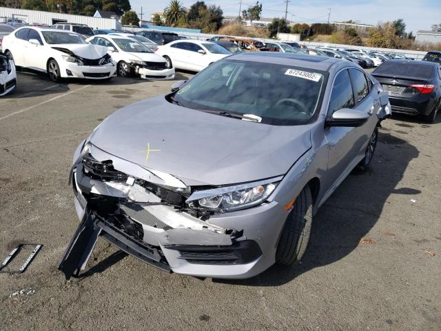 Photo 2 from auction – 2018 HONDA CIVIC EX with VIN 2HGFC2F74JH534912