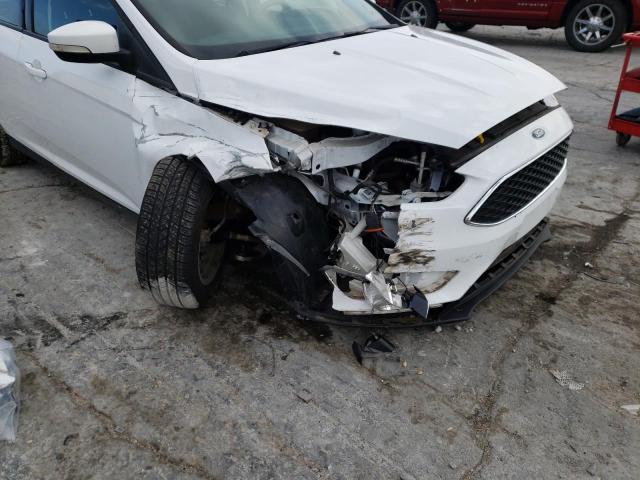 Photo 9 from auction – 2016 FORD FOCUS with VIN 1FADP3K22GL262632