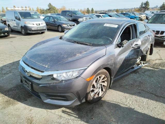 Photo 2 from auction – 2016 HONDA CIVIC LX with VIN 2HGFC2F59GH561322