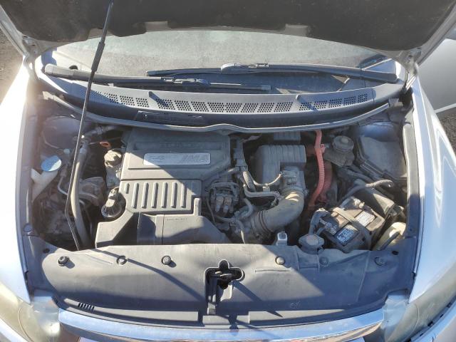 Photo 11 from auction – 2006 HONDA CIVIC HYBR with VIN JHMFA36276S014958