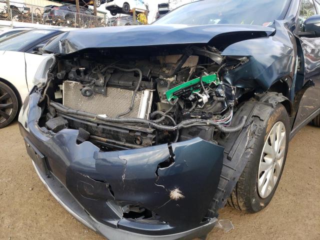Photo 9 from auction – 2015 NISSAN ROGUE S with VIN 5N1AT2MV6FC855057