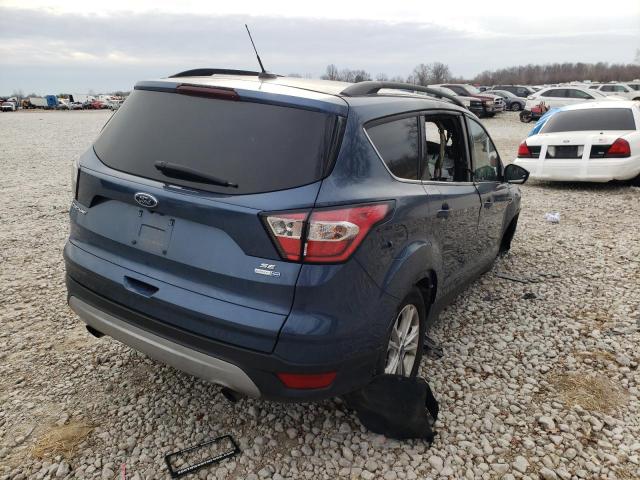 Photo 4 from auction – 2018 FORD ESCAPE SE with VIN 1FMCU9GD8JUC04761