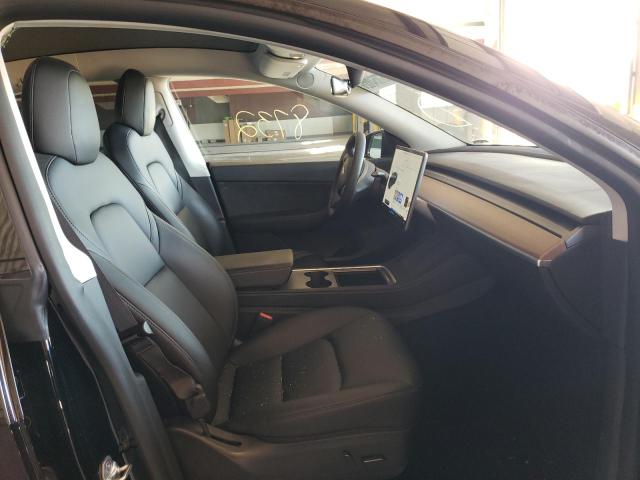 Photo 5 from auction – 2022 TESLA MODEL Y with VIN 7SAYGAEE1NF366215