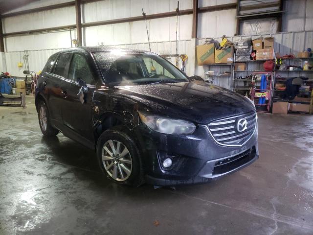 MAZDA CX-5 TOURI 2016 with VIN JM3KE2CY2G0624701 - Photo from auction