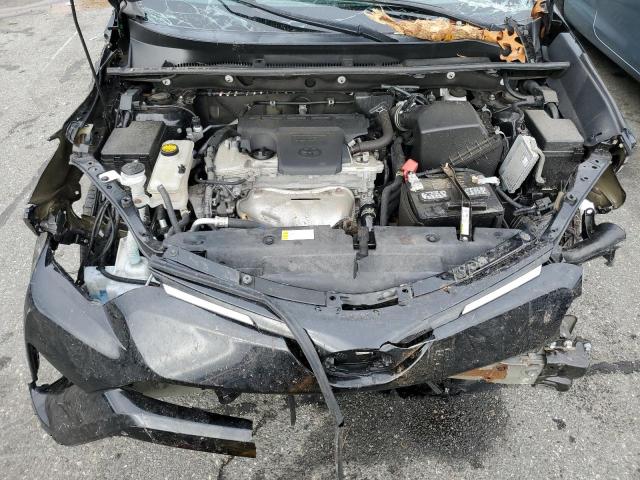 Photo 7 from auction – 2018 TOYOTA RAV4 LE with VIN 2T3BFREV2JW806032
