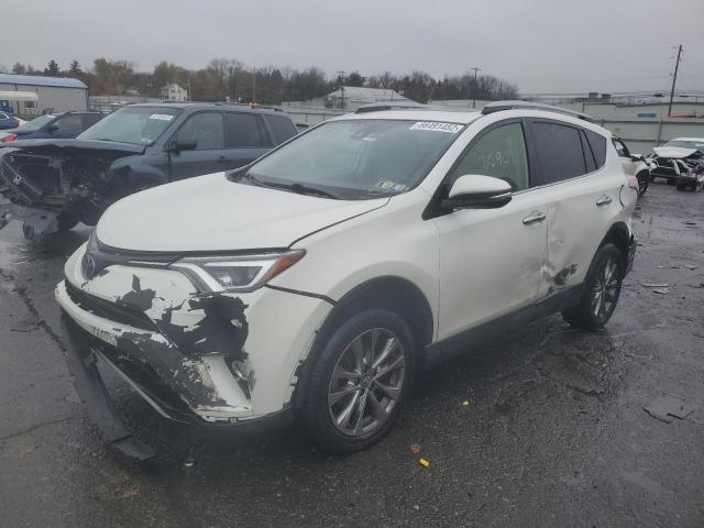 Photo 2 from auction – 2018 TOYOTA RAV4 LIMIT with VIN JTMDFREV9JD246130